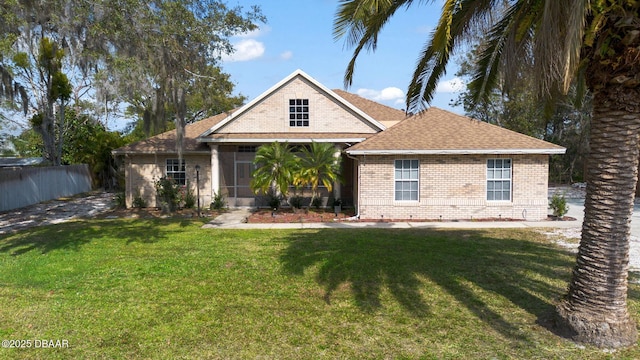 view of front of home with a front lawn