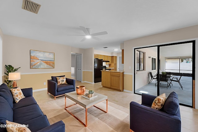 59 Blakeport Ln, Palm Coast, FL 32137 - living area featuring a ceiling fan and light tile patterned flooring
