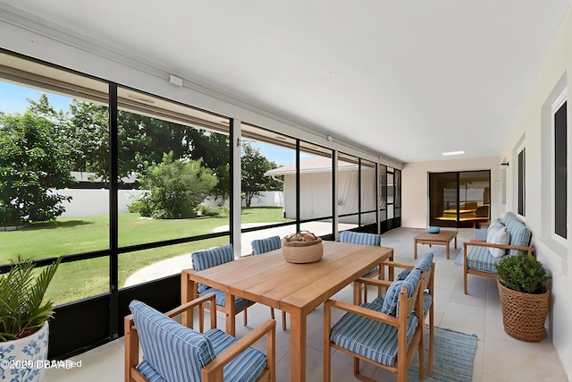 59 Blakeport Ln, Palm Coast, FL 32137 - sunroom / solarium featuring healthy amount of natural light and an outdoor hangout area