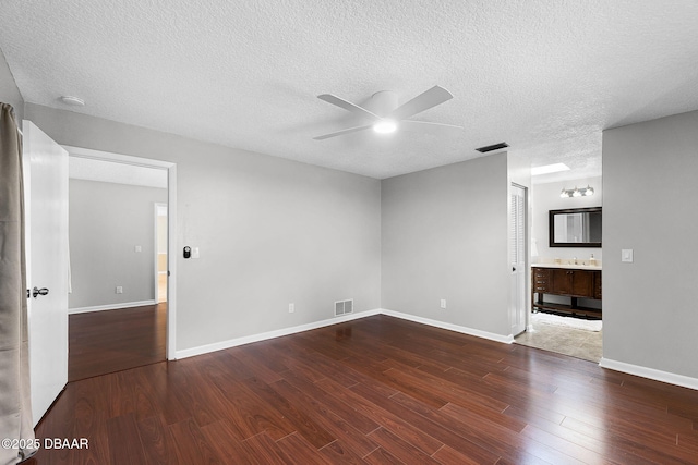 59 Blakeport Ln, Palm Coast, FL 32137 - spare room featuring a ceiling fan, wood finished floors, and a textured ceiling