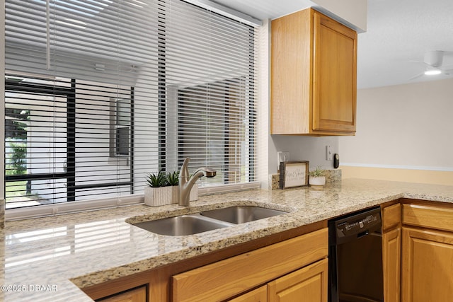 59 Blakeport Ln, Palm Coast, FL 32137 - kitchen featuring dishwasher and light stone countertops
