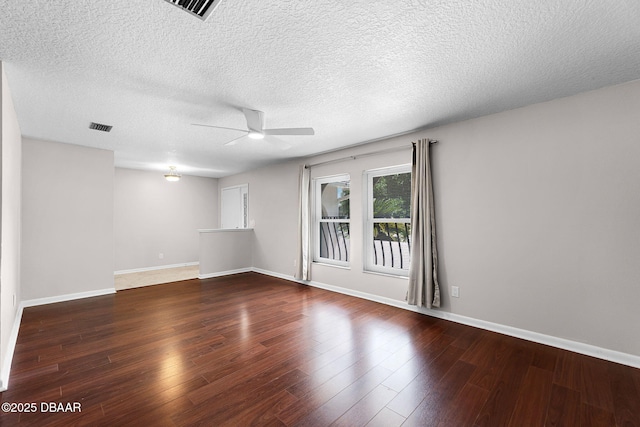 59 Blakeport Ln, Palm Coast, FL 32137 - empty room featuring a ceiling fan, wood finished floors, and a textured ceiling