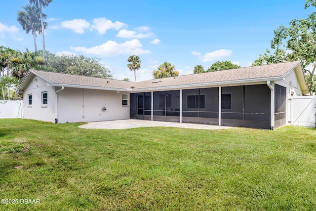 59 Blakeport Ln, Palm Coast, FL 32137 - rear view of property featuring a sunroom, a patio area, a fenced backyard, stucco siding, and a shingled roof