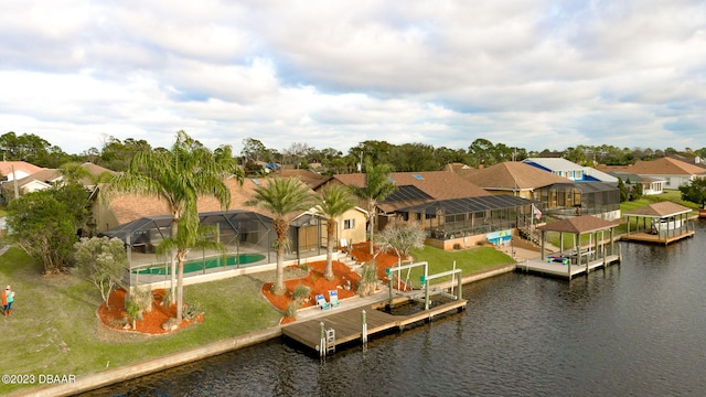 drone / aerial view featuring a water view