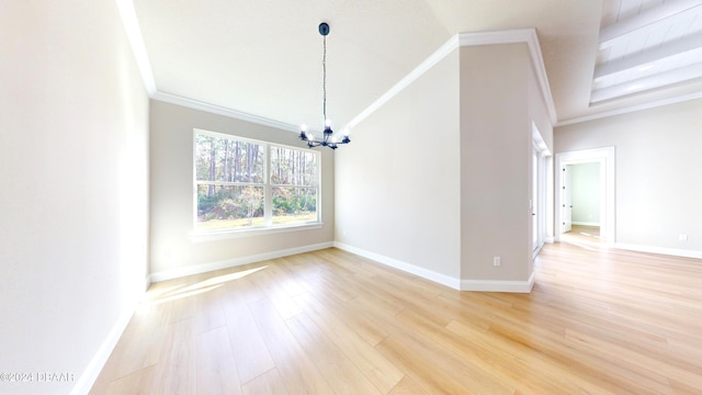 interior space with crown molding, light hardwood / wood-style flooring, and an inviting chandelier