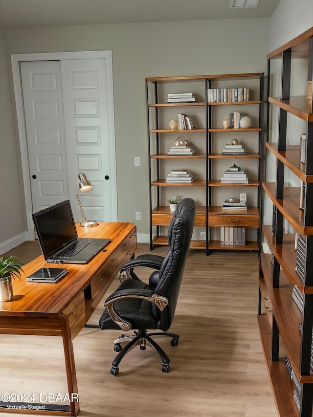 office area with light wood-type flooring