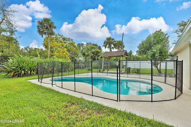 view of swimming pool featuring a gazebo, a patio area, and a lawn