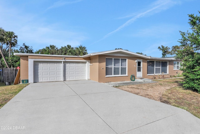 ranch-style home with a garage