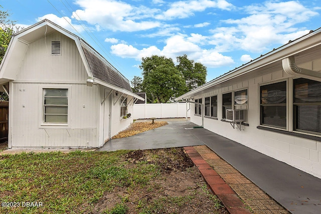 view of home's exterior with a patio area