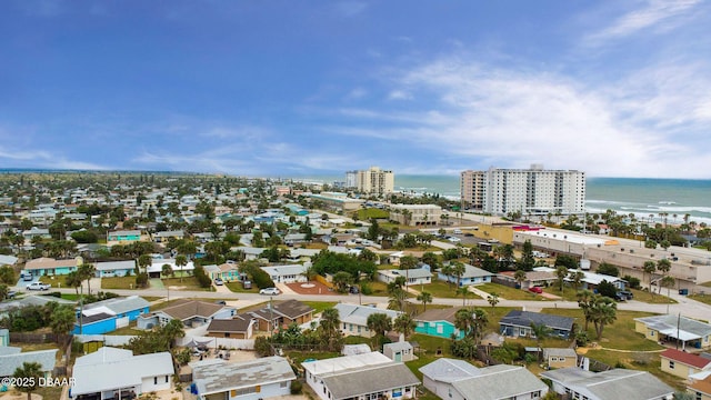 aerial view featuring a city view and a water view