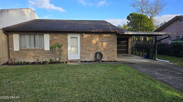 view of home's exterior featuring a yard and a carport