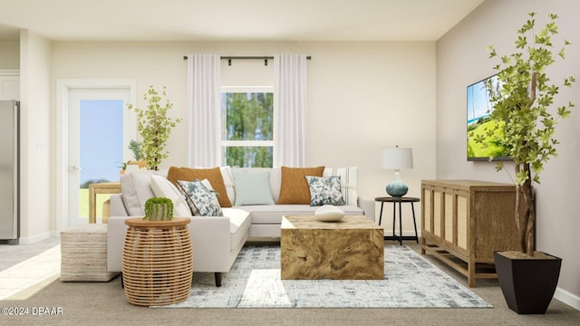 sitting room featuring light carpet