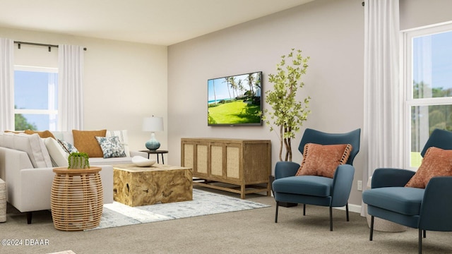 living area featuring plenty of natural light and carpet flooring