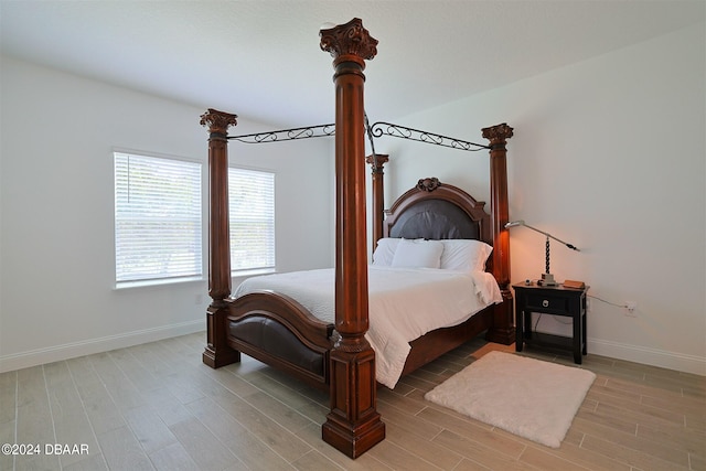 bedroom with light hardwood / wood-style flooring