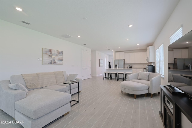 living room featuring light hardwood / wood-style floors