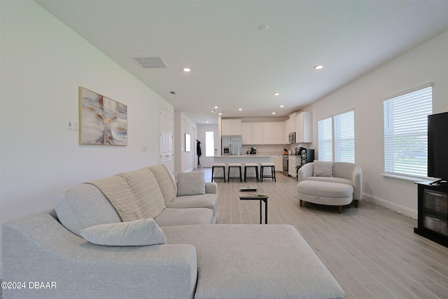 living room featuring light hardwood / wood-style flooring