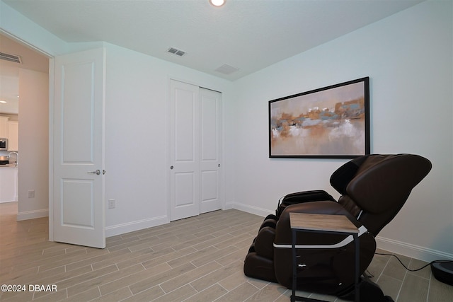 living area featuring light hardwood / wood-style floors