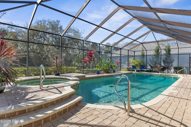 view of pool with a patio, a pool with connected hot tub, and a lanai