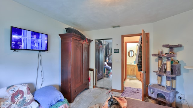 bedroom featuring connected bathroom