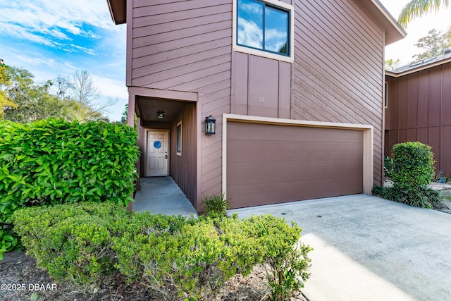 16 Wildwood Trl, Ormond Beach, FL 32174 - entrance to property featuring a garage and driveway