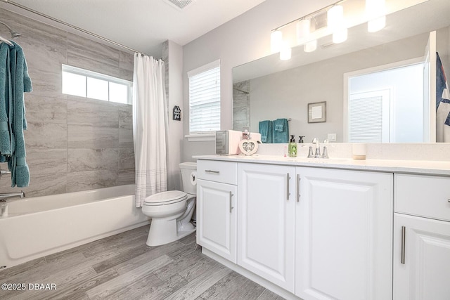 3417 Medici Blvd, New Smyrna Beach, FL 32168 - bathroom with vanity, shower / tub combo with curtain, and wood finished floors