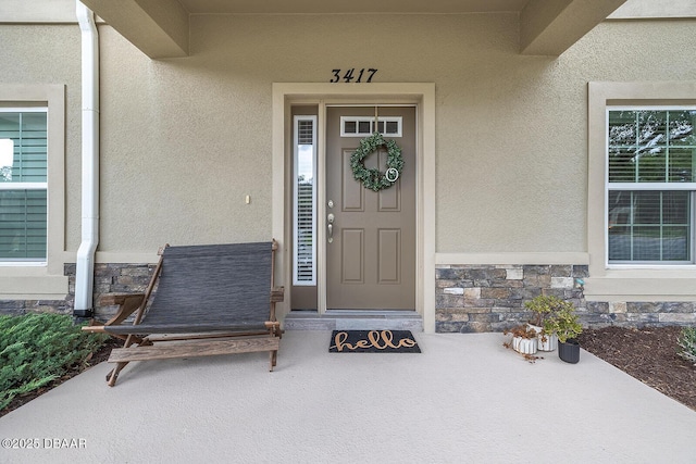 3417 Medici Blvd, New Smyrna Beach, FL 32168 - entrance to property featuring stone siding and stucco siding