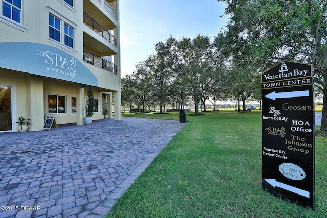 3417 Medici Blvd, New Smyrna Beach, FL 32168 - view of home's community featuring a lawn