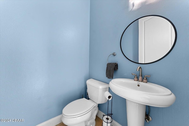 bathroom featuring toilet