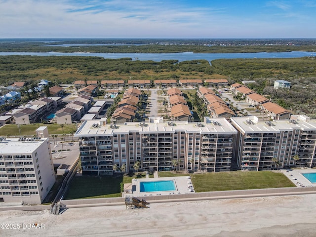 bird's eye view with a water view