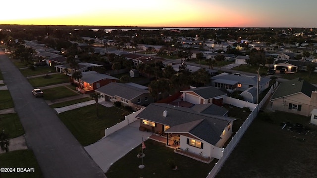 aerial view at dusk with a residential view