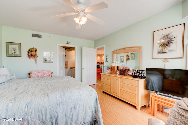 bedroom featuring light hardwood / wood-style flooring and ceiling fan