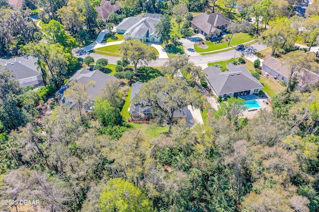 birds eye view of property with a residential view