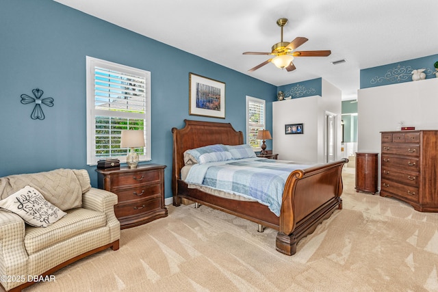 bedroom featuring visible vents, a ceiling fan, and carpet