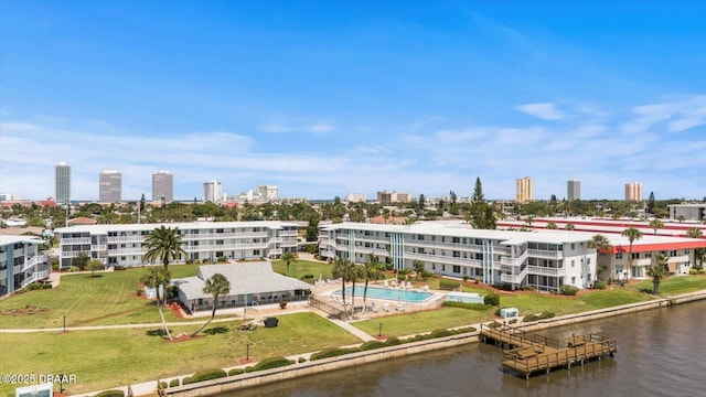 aerial view featuring a view of city and a water view