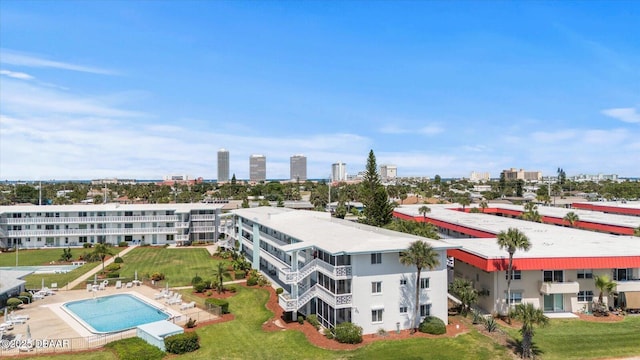 birds eye view of property with a view of city