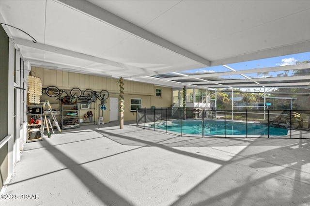 view of pool featuring a fenced in pool, a patio, and a lanai