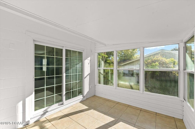 unfurnished sunroom with plenty of natural light