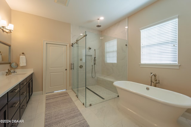 bathroom with vanity and plus walk in shower