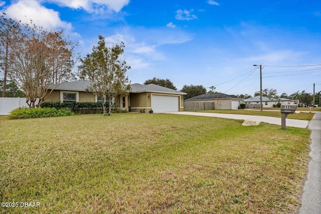 single story home with a garage and a front yard