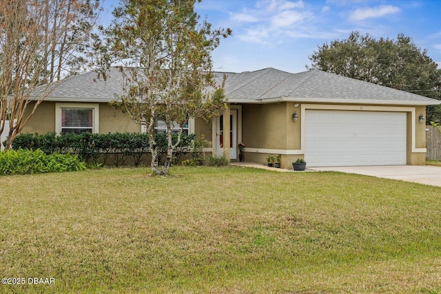 view of front of house with a garage and a front lawn