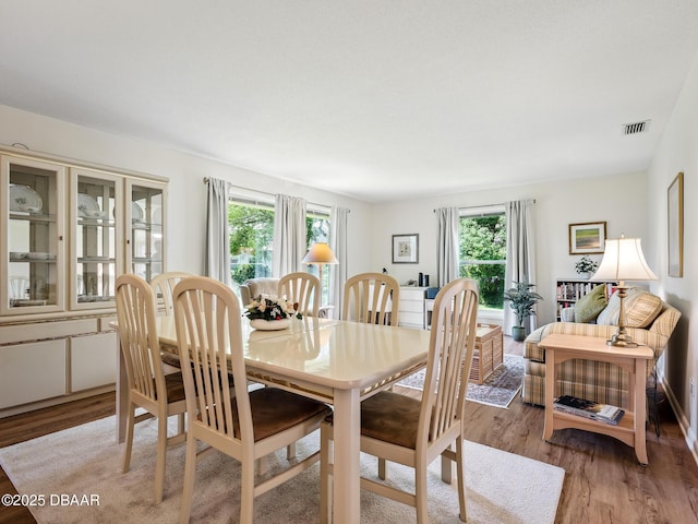 257 Sweet Bay Ave, New Smyrna Beach, FL 32168 - dining area featuring light wood-style floors