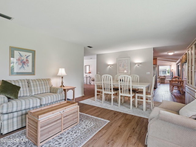 257 Sweet Bay Ave, New Smyrna Beach, FL 32168 - living area featuring wood finished floors and baseboards