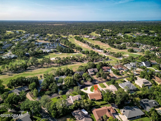 257 Sweet Bay Ave, New Smyrna Beach, FL 32168 - aerial view of property's location with a golf course, nearby suburban area, and a nearby body of water