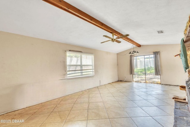 4519 Saxon Dr, New Smyrna Beach, FL 32169 - unfurnished room with healthy amount of natural light, tile patterned flooring, and ceiling fan