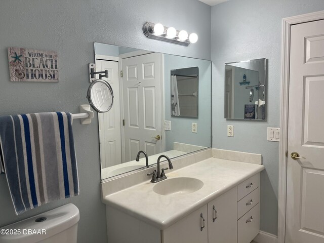 5988 Heron Pond Dr, Port Orange, FL 32128 - bathroom with toilet and vanity