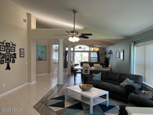 5988 Heron Pond Dr, Port Orange, FL 32128 - living room featuring ornate columns, ceiling fan, and vaulted ceiling