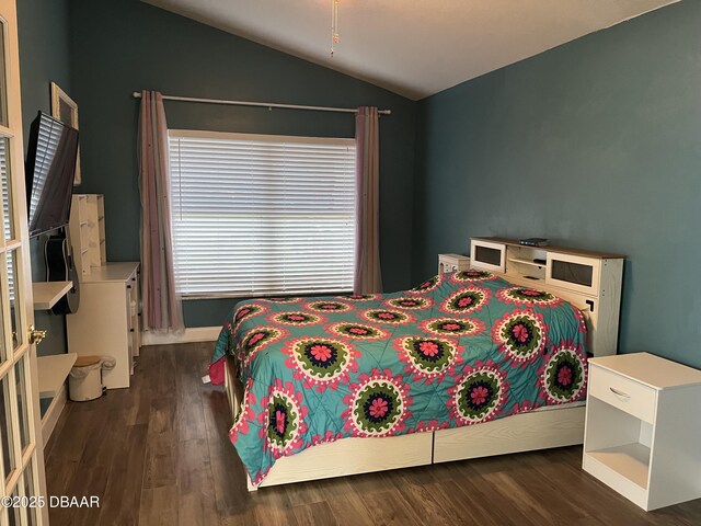 5988 Heron Pond Dr, Port Orange, FL 32128 - bedroom featuring lofted ceiling and wood finished floors