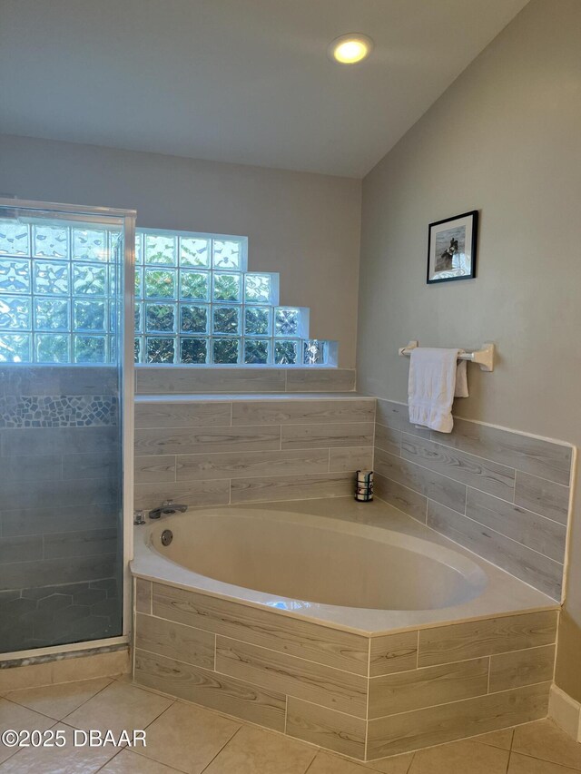 5988 Heron Pond Dr, Port Orange, FL 32128 - bathroom with tile patterned flooring, a bath, a shower stall, and recessed lighting