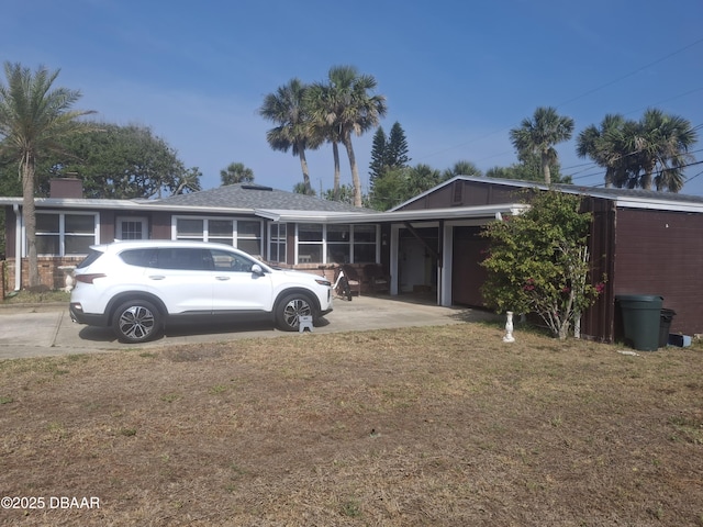 179 Ponce De Leon Dr, Ormond Beach, FL 32176 - view of front of home featuring a front yard and driveway