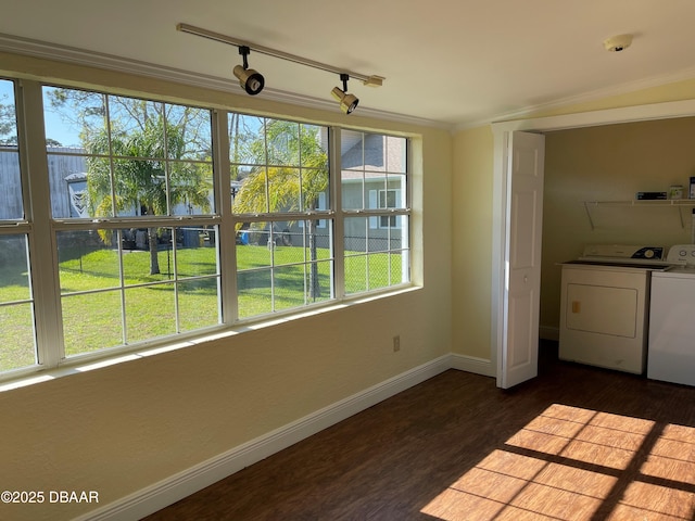 660 S Ridgewood Ave, Ormond Beach, FL 32174 - unfurnished sunroom featuring washer and dryer